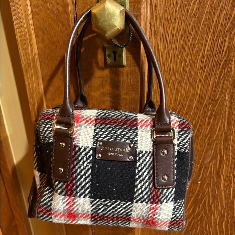 Kate Spade tartan handbag. Plaid wool like texture with leather trim.